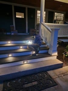 Outdoor-Lighting-Problems-Technician-Working