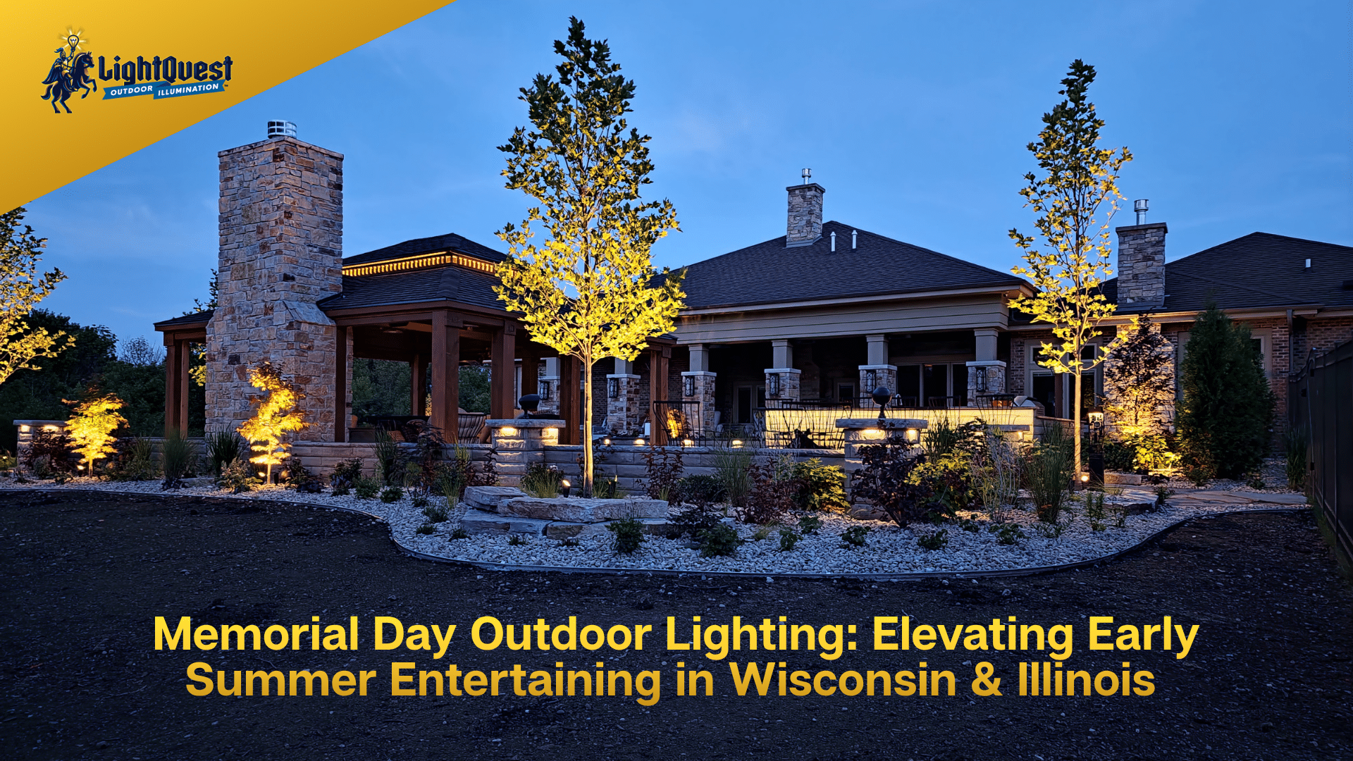 Luxury brick home in Wisconsin and Illinois illuminated with warm architectural landscape lighting, tree lighting, and pathway lighting for summer outdoor safety.